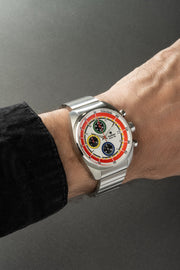 White chronograph on the wrist with a bracelet