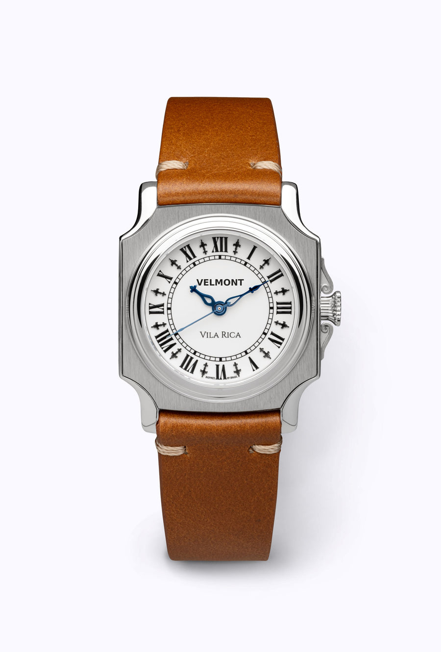 Small cushion-case watch on a caramel strap
