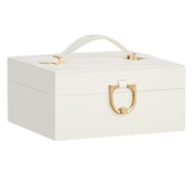 Closed cream jewelry organizer with carry handle and gold-tone D-ring clasp
