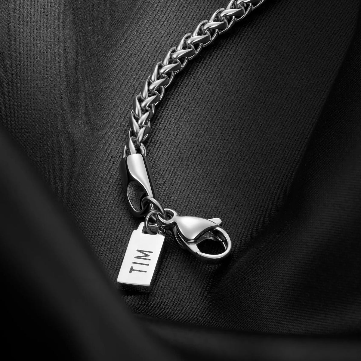 Close-up of the lobster clasp and tag