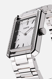 Angled view of the rectangular case with clear stones along the sides