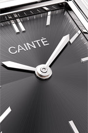 Close-up of the black sunburst dial and polished hands