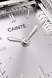 Close-up of the silver-white sunburst dial and stone-set edge