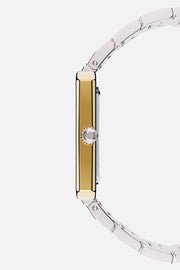 Side profile showing the slim case and fluted crown