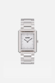 Front view of the rectangular watch with white dial on its link bracelet