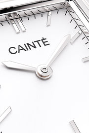 Close-up of the white sunburst dial and polished hands