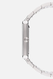 Side profile showing the slim case and fluted crown