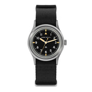 Black-dial field watch with cream hands
