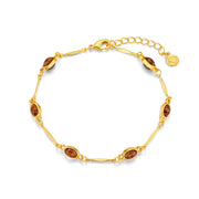 Gold-tone bar link bracelet with brown oval stones