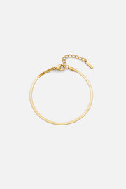 Gold-tone 2 mm herringbone bracelet, front view on a light background
