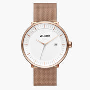 Straight-on look at the white dial and rose gold-tone case with its rose gold-tone mesh strap.