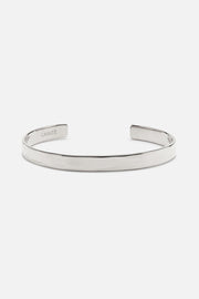 Silver-tone hammered cuff bracelet, front view on a light background