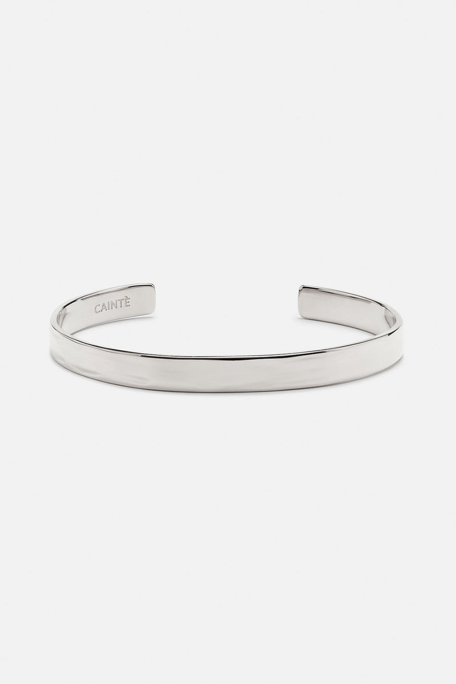 Silver-tone hammered cuff bracelet, front view on a light background