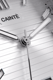 Close-up of the white horizontally ridged dial and hands
