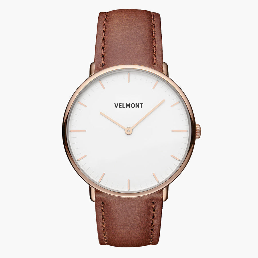 White-dial watch with a rose gold-tone case and brown strap, facing forward.