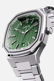Three-quarter view of the octagonal case and olive green textured dial