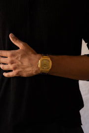 Close-up of the watch on a wrist against black