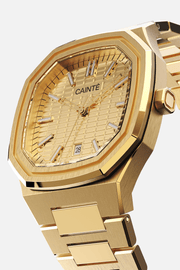 Three-quarter view of the octagonal case and gold-tone textured dial