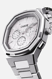Three-quarter view of the octagonal case and all-white chronograph dial