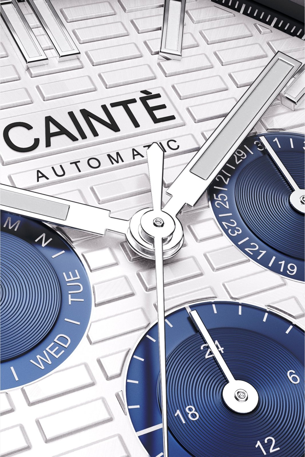Macro view of the white day-date dial and polished hands