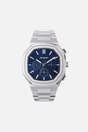 Front view of the octagonal watch with tonal blue chronograph dial on its integrated bracelet