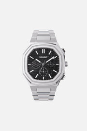 Front view of the octagonal watch with black chronograph dial on its integrated bracelet