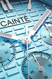 Macro view of the turquoise chronograph dial and polished hands