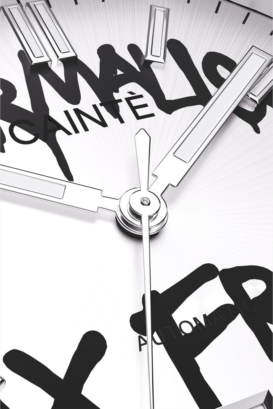 Macro view of the white dial with black graffiti lettering and polished hands