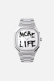 Front view of the octagonal watch with white dial with black graffiti lettering on its integrated bracelet