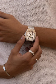 Close view of hands adjusting the watch