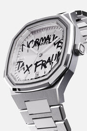 Three-quarter view of the octagonal case and white dial with black graffiti lettering
