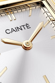 Close-up of the white sunburst dial and polished hands