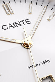 Close-up of the white sunburst dial, baton markers and hands