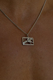 Silver-tone necklace with a rectangular horse and rider plaque, view 4 of 8