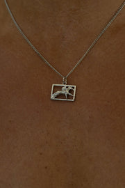 Silver-tone necklace with a rectangular horse and rider plaque, view 7 of 8