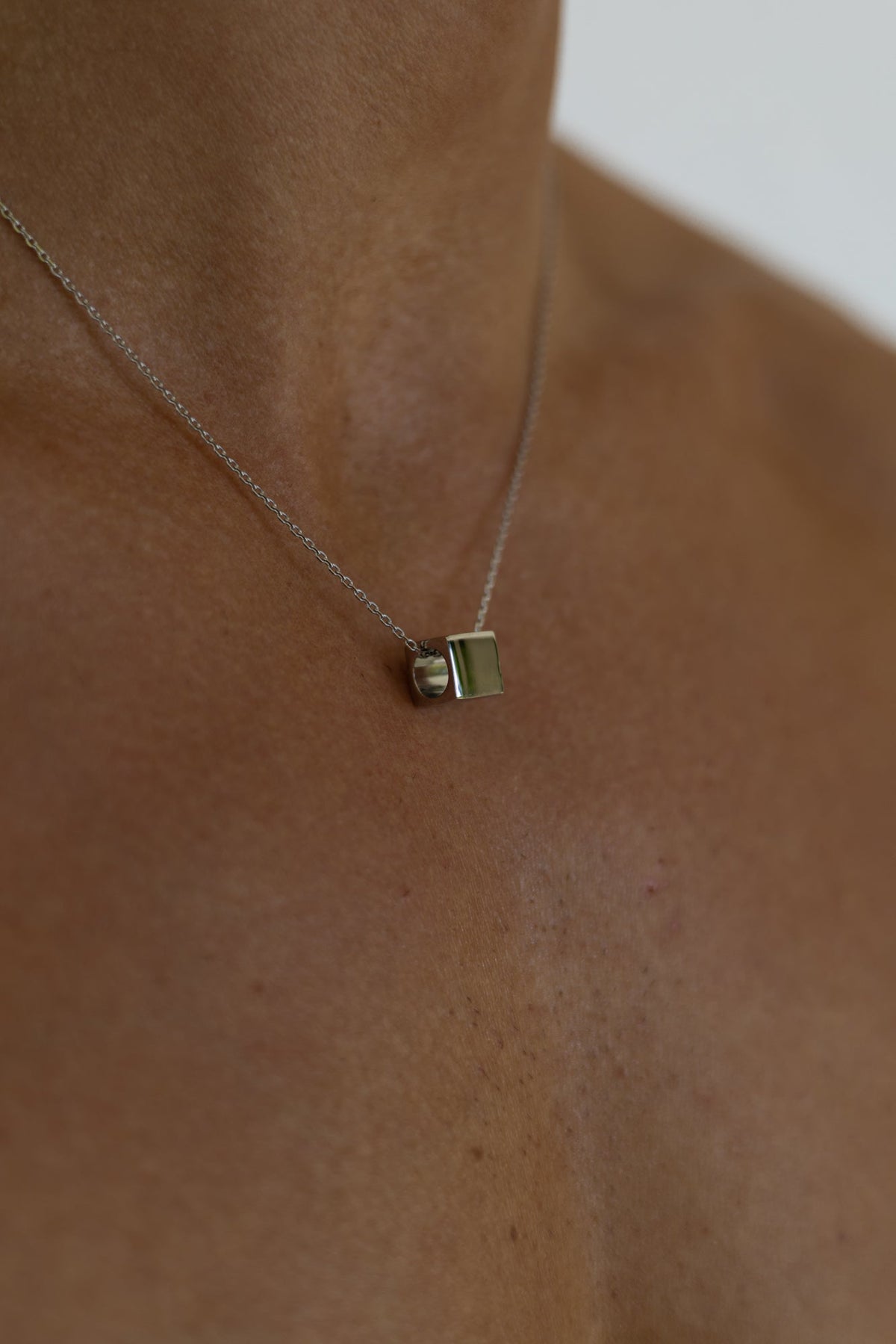Silver-tone cube pendant necklace, view 4 of 7