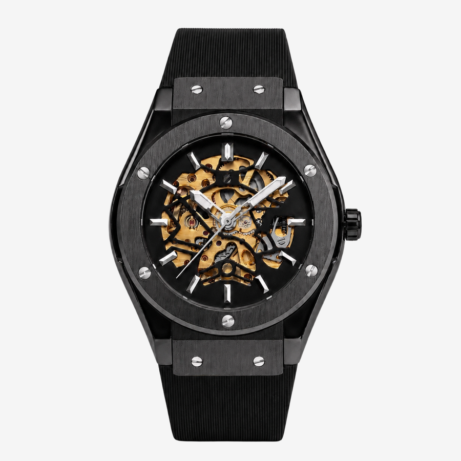Black skeleton watch with gold-tone movement on a black rubber strap