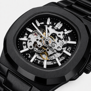 Close-up of the black skeleton dial