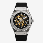 Brushed steel skeleton watch on a black rubber strap
