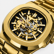 Close-up of the gold-tone skeleton dial