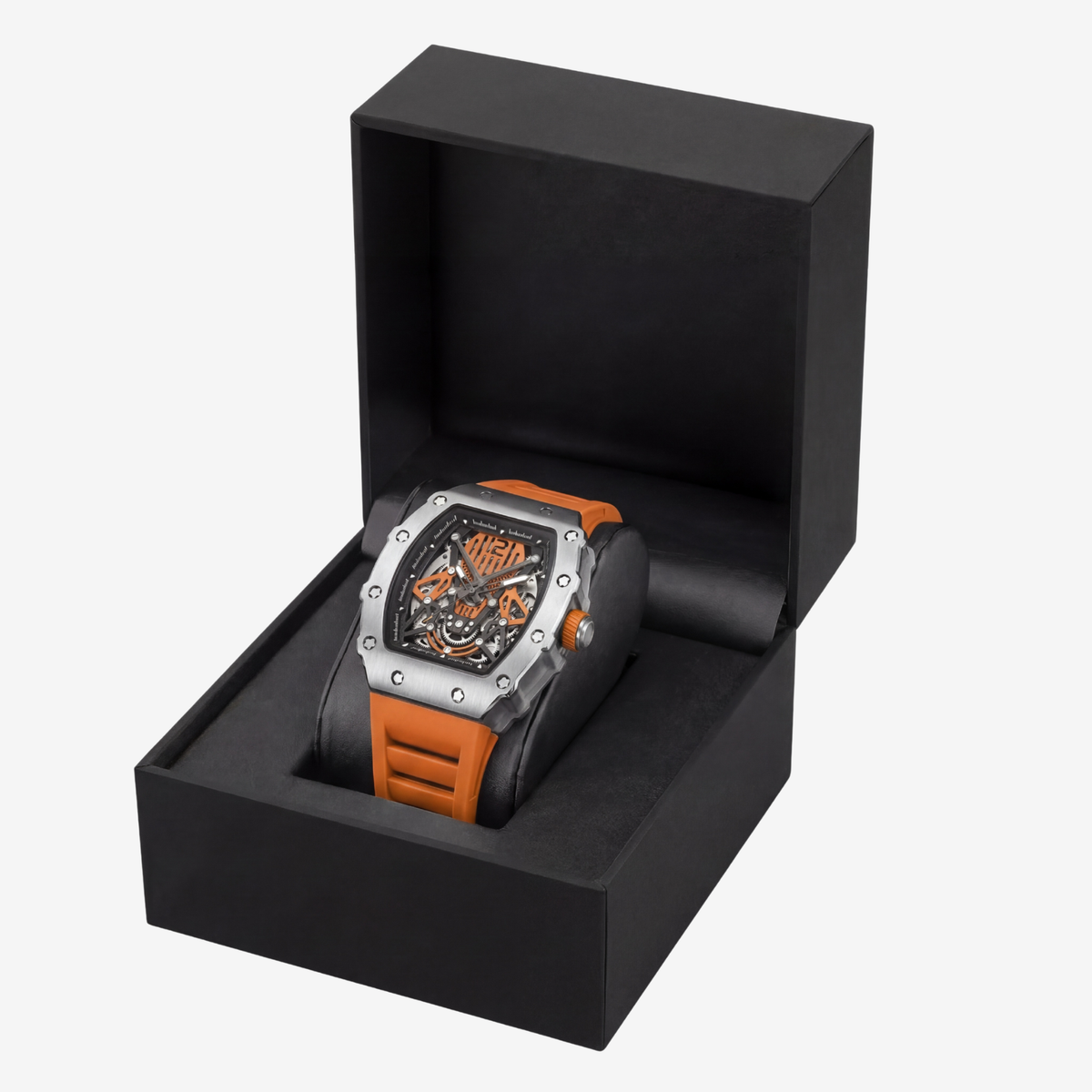 Orange skeleton watch in an open presentation box
