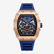 Rose gold-tone tonneau skeleton watch with blue strap