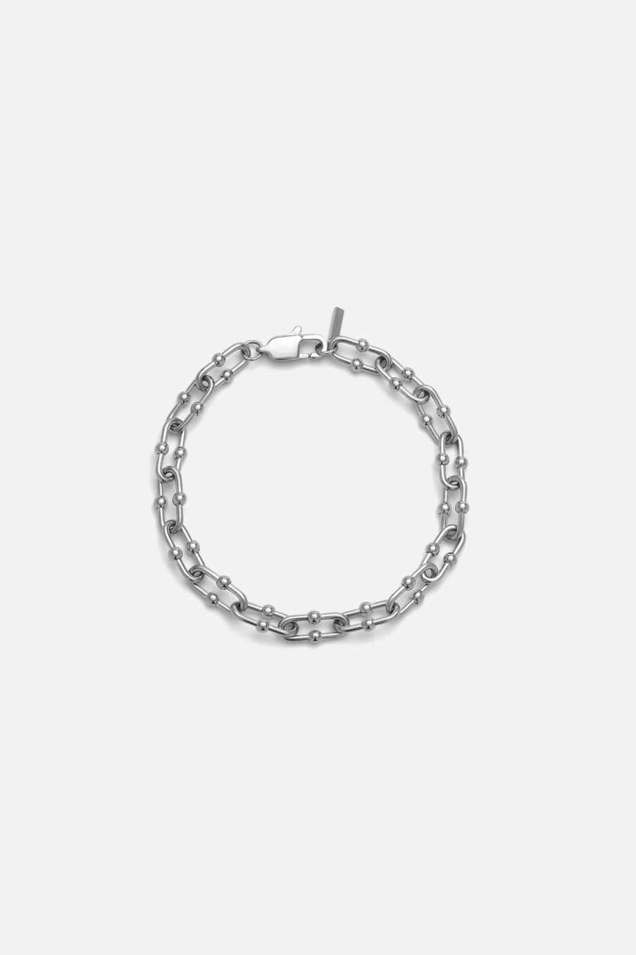 Silver-tone 7 mm chain bracelet, front view on a light background