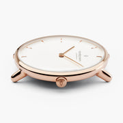 Side profile of the rose gold-tone case with thin tubular lugs.