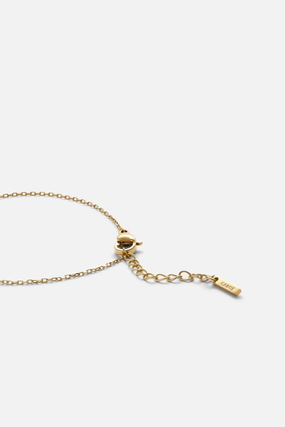 Gold-tone heart bracelet with a tiny stone, view 3 of 4