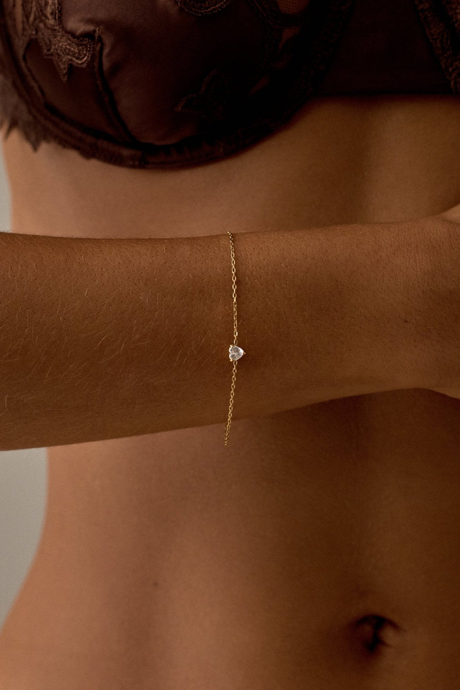 Gold-tone heart bracelet with a tiny stone, view 2 of 4