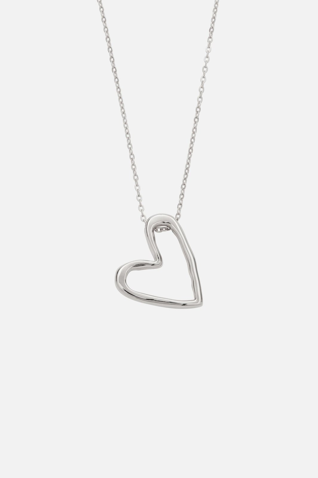 Silver-tone open heart necklace, front view on a light background