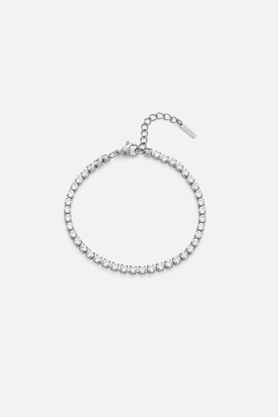 Silver-tone tennis bracelet with clear stones, front view on a light background