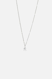 Silver-tone dainty pendant necklace, front view on a light background
