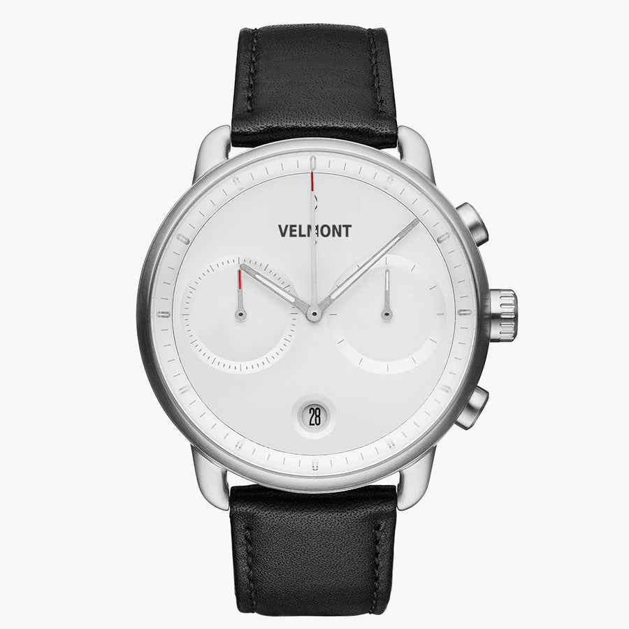 Chronograph-style watch with a white dial and silver-tone case on a black strap.